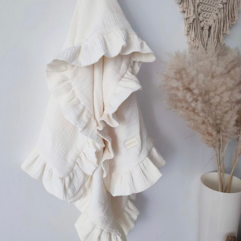 Muslin blanket with ruffles